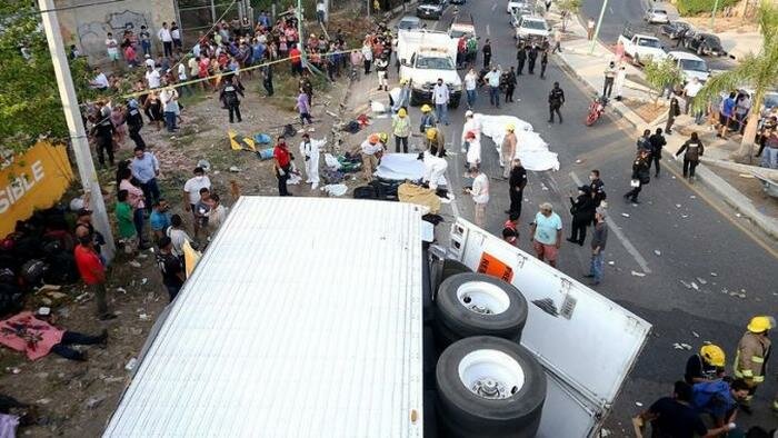 54 Dead, 105 Injured After Tractor-Trailer Of Migrants Headed To US Crashes In Mexico